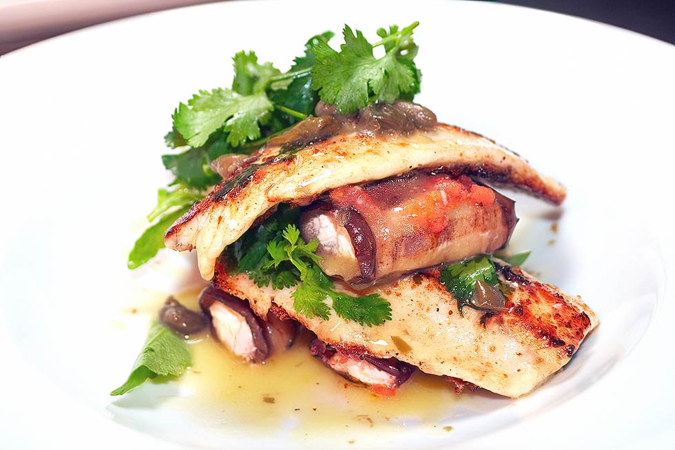 Grilled seabass with cheese-bacon rolls