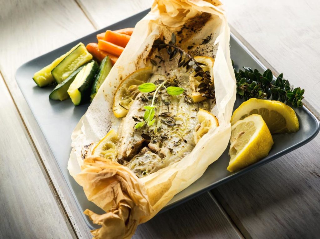 Sole Fish Oven-Cooked in Parchment with Herbs and Lemon