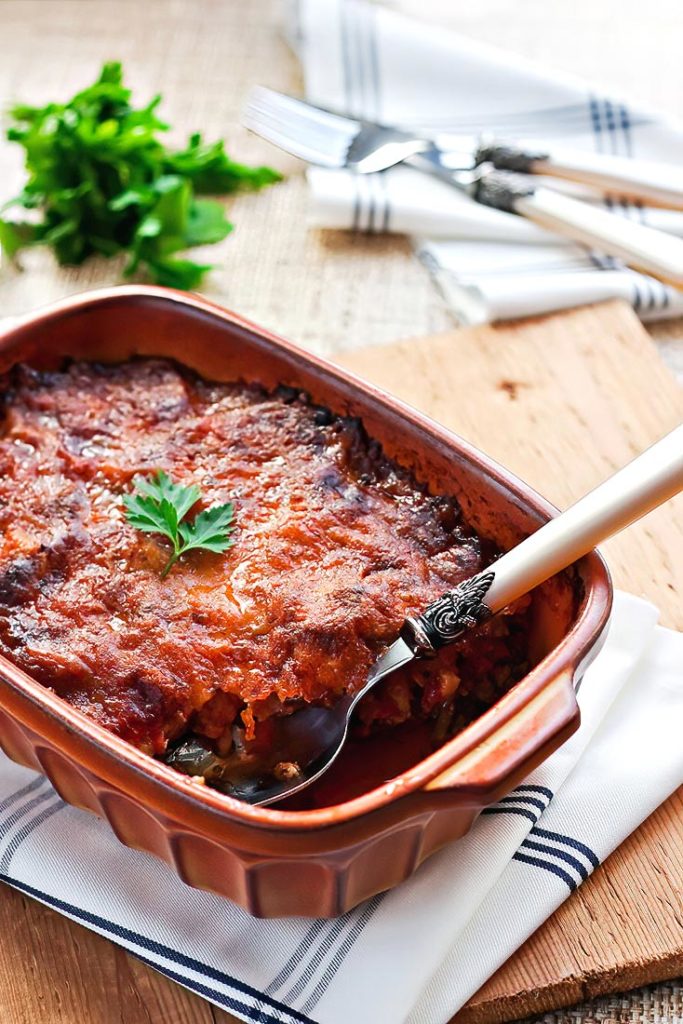 Indulge in the classic flavors of Greece with this deliciously layered moussaka, a perfect harmony of tender vegetables, spiced meat, and creamy béchamel sauce.